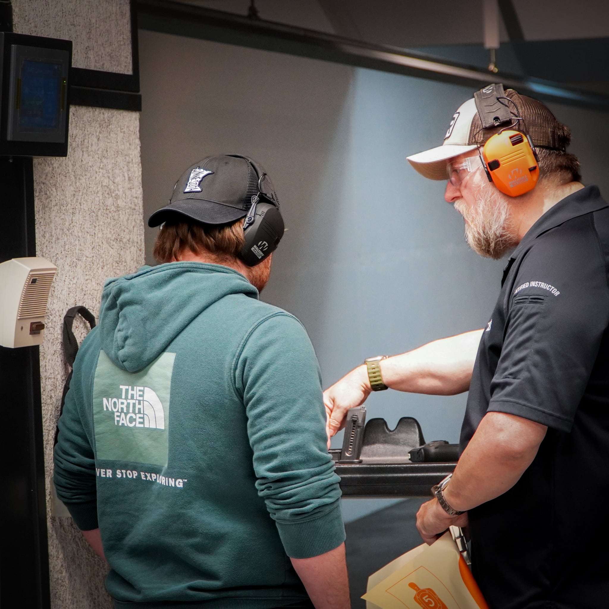 Student receiving expert instruction during permit to carry class.