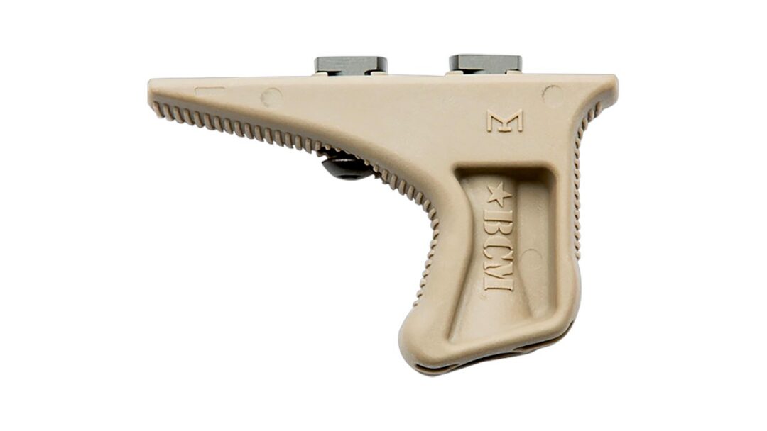 Beige plastic pistol-grip tool with a serrated edge running along the top, resembling a handheld scraper or cutter.