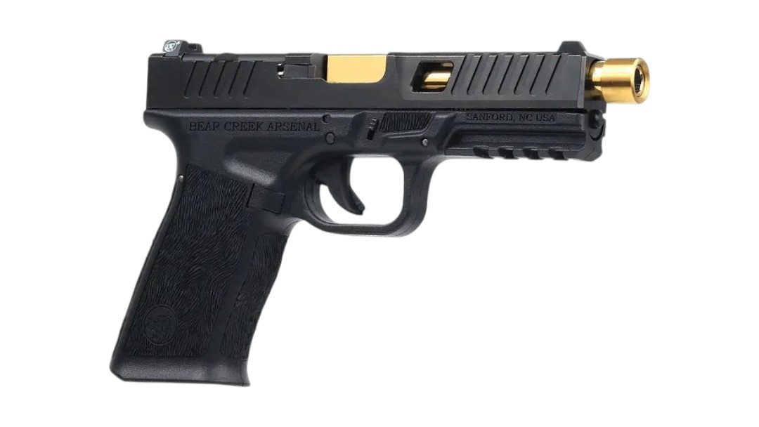 Black semi-automatic pistol with a gold-colored muzzle, side view, labeled Bear Creek Arsenal (product image).