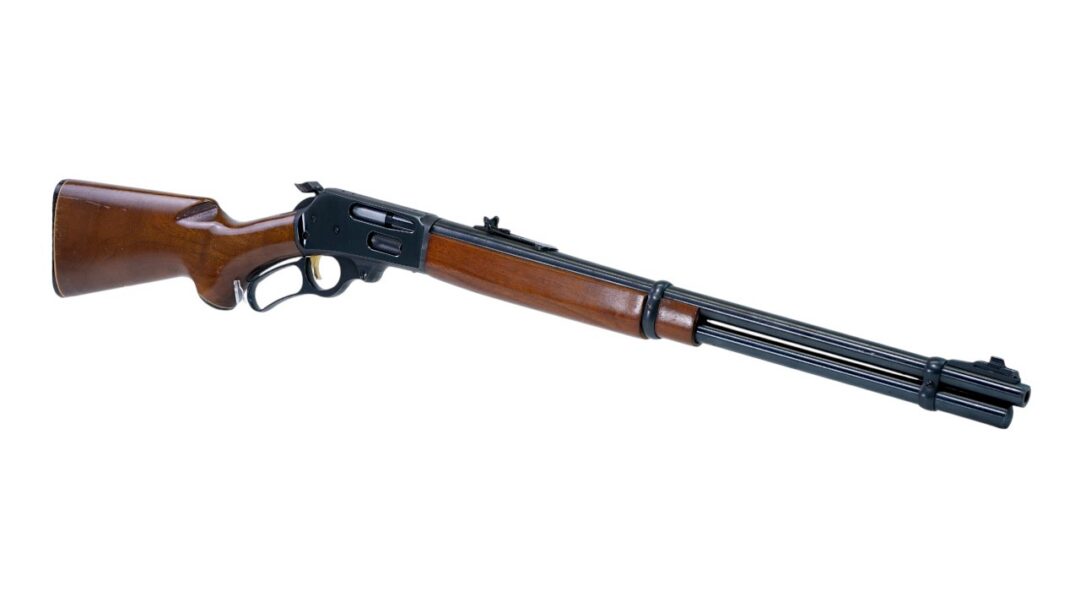 Lever-action rifle with a wooden stock and long barrel on a white background.